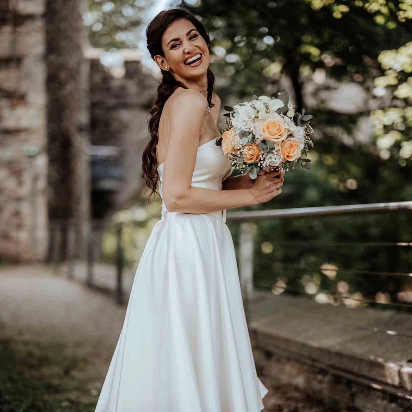 Braut mit Hochzeitskleid Mode Max Hansen Brautmodegeschäft Tolk Hochzeit Nordfriesland